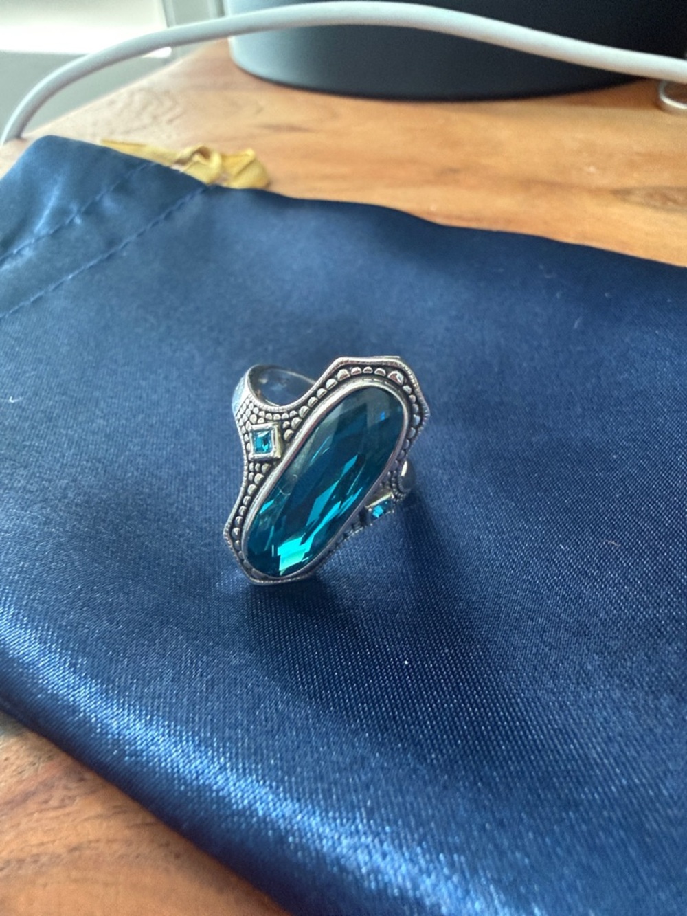 Silver-Tone Ring with Teal Crystal Accent